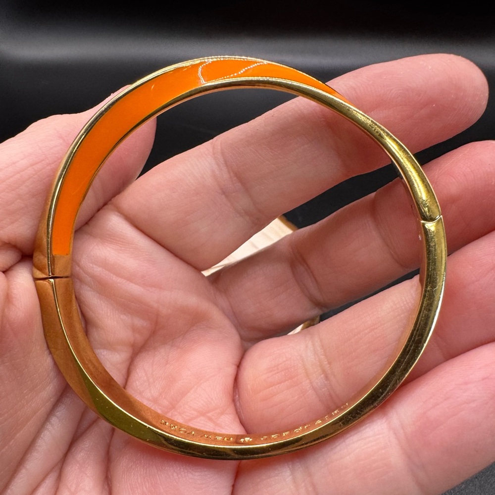 Kate Spade Enamel Gold and Orange latch Bangle